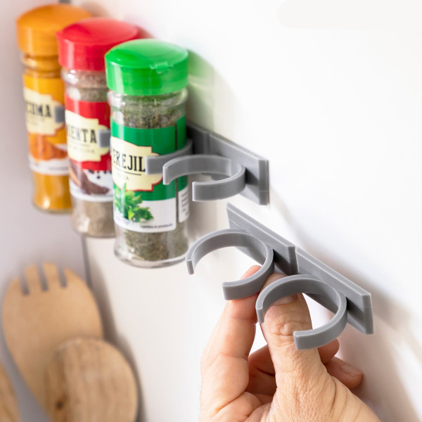 Adhesive and Divisible Condiment Holder