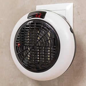Calefactor de enchufe pequeño cerámico HABITEX 450 W - Ferretería en  Tomelloso Comercial Caro